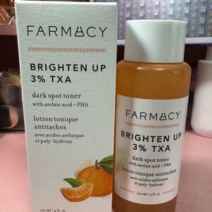 Farmacy Brighten Up 3% TXA Toner in Orange Bottle